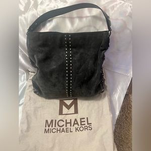 Michael Kors suede hobo with silver tone studs.